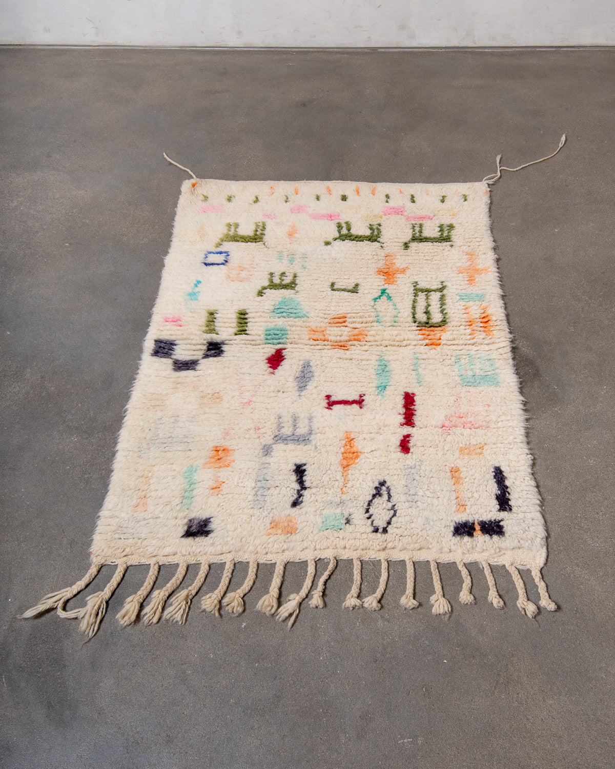 Modern, designer, handcrafted Berber rug from Morocco. Vintage carpet with beautiful colours and patterns and fluffy texture.
